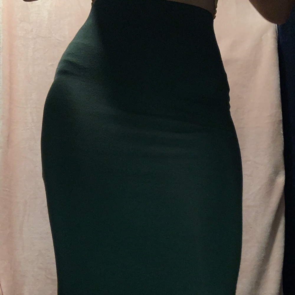 Long dark green tight skirt